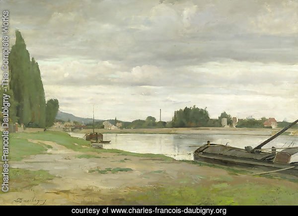 River landscape with barge moored